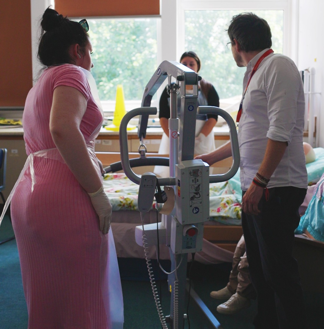 Care professionals with some equipment