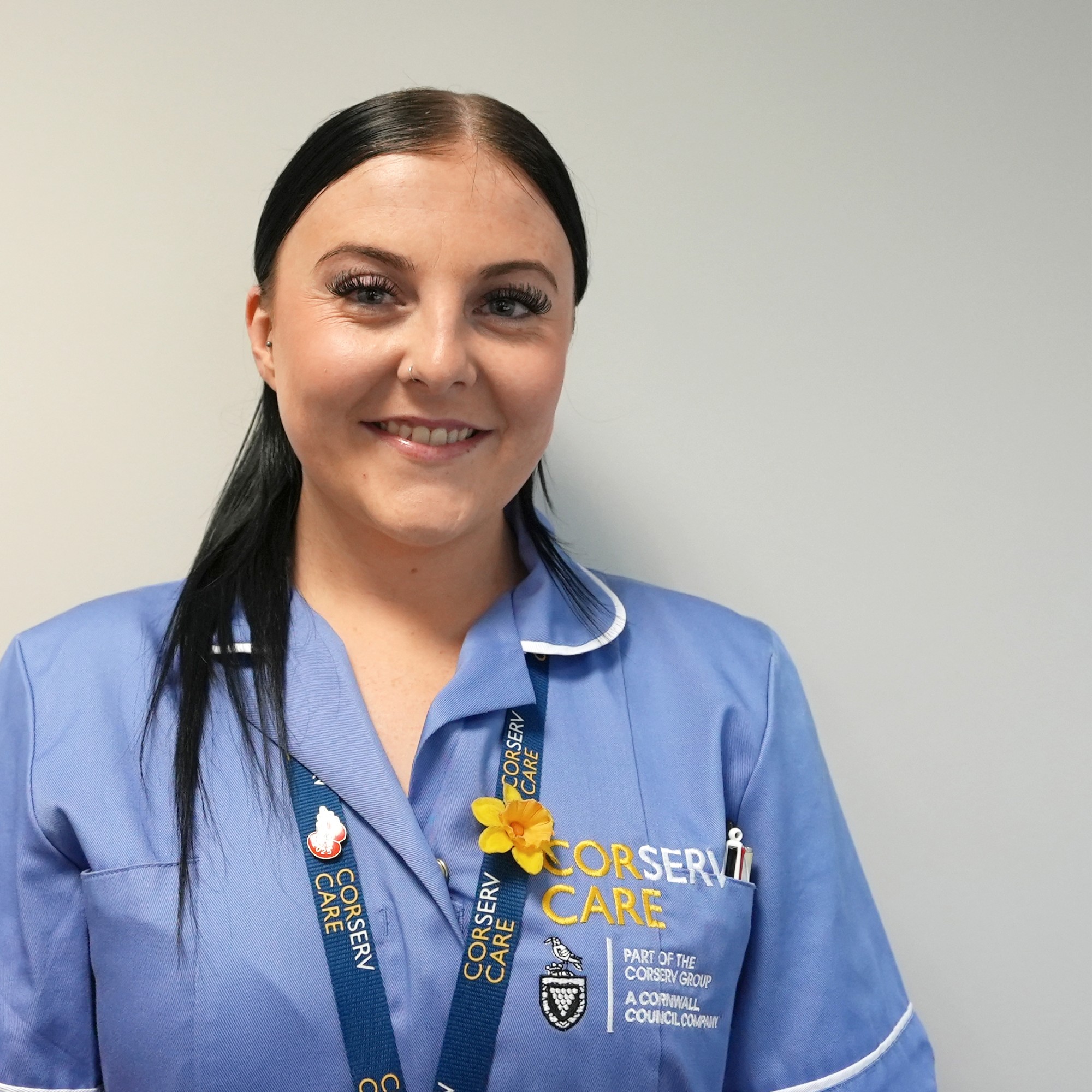 Female home care manager smiling at the camera