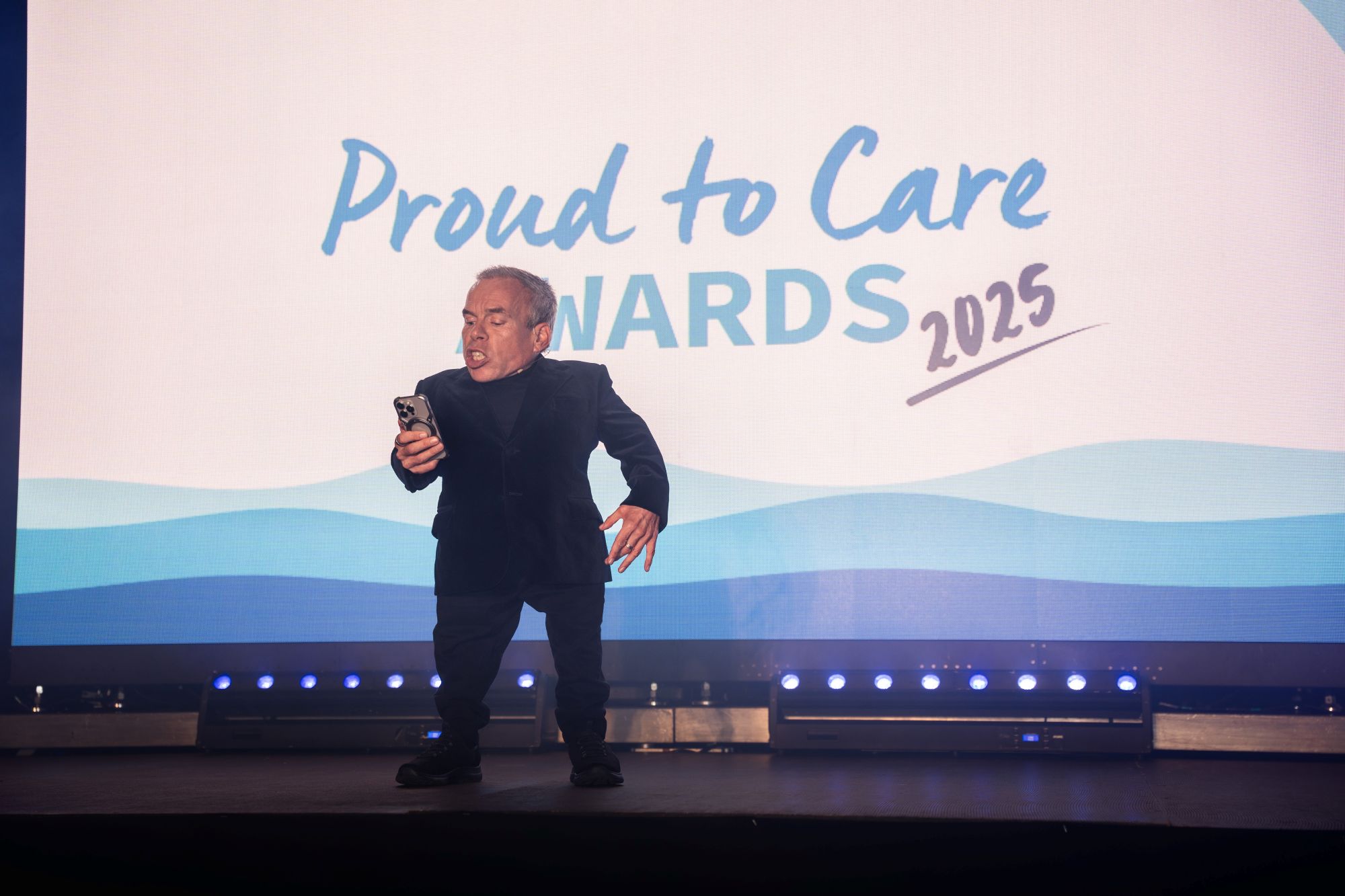 Winners on stage with Warwick 